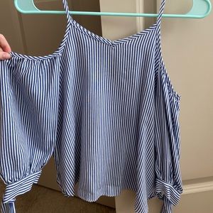 Soprano stripped off the shoulder top